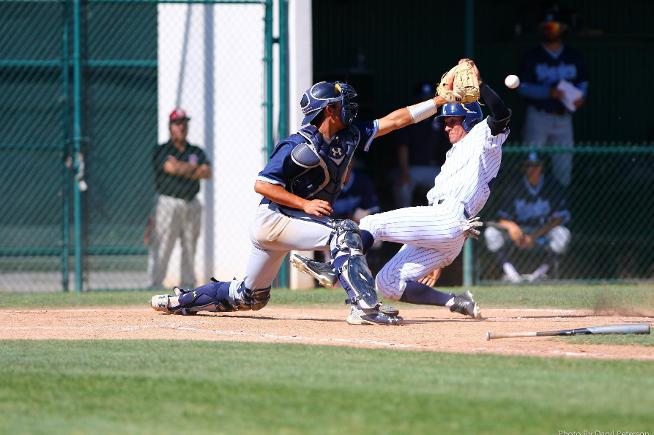 Mike Heenan slides safe for one of the Falcons 11 runs