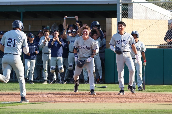 Falcons get ready to celebrate with Nate Gardenswartz (21), as the team completes the sweep over Allan Hancock College