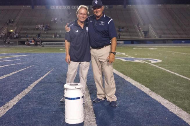 (L-R) El Camino coach John Featherstone & Cerritos coach Frank Mazzotta with the Milk Can Trophy