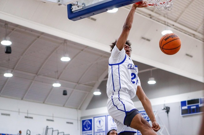 Justin Stephens slams home two points against the Seahawks