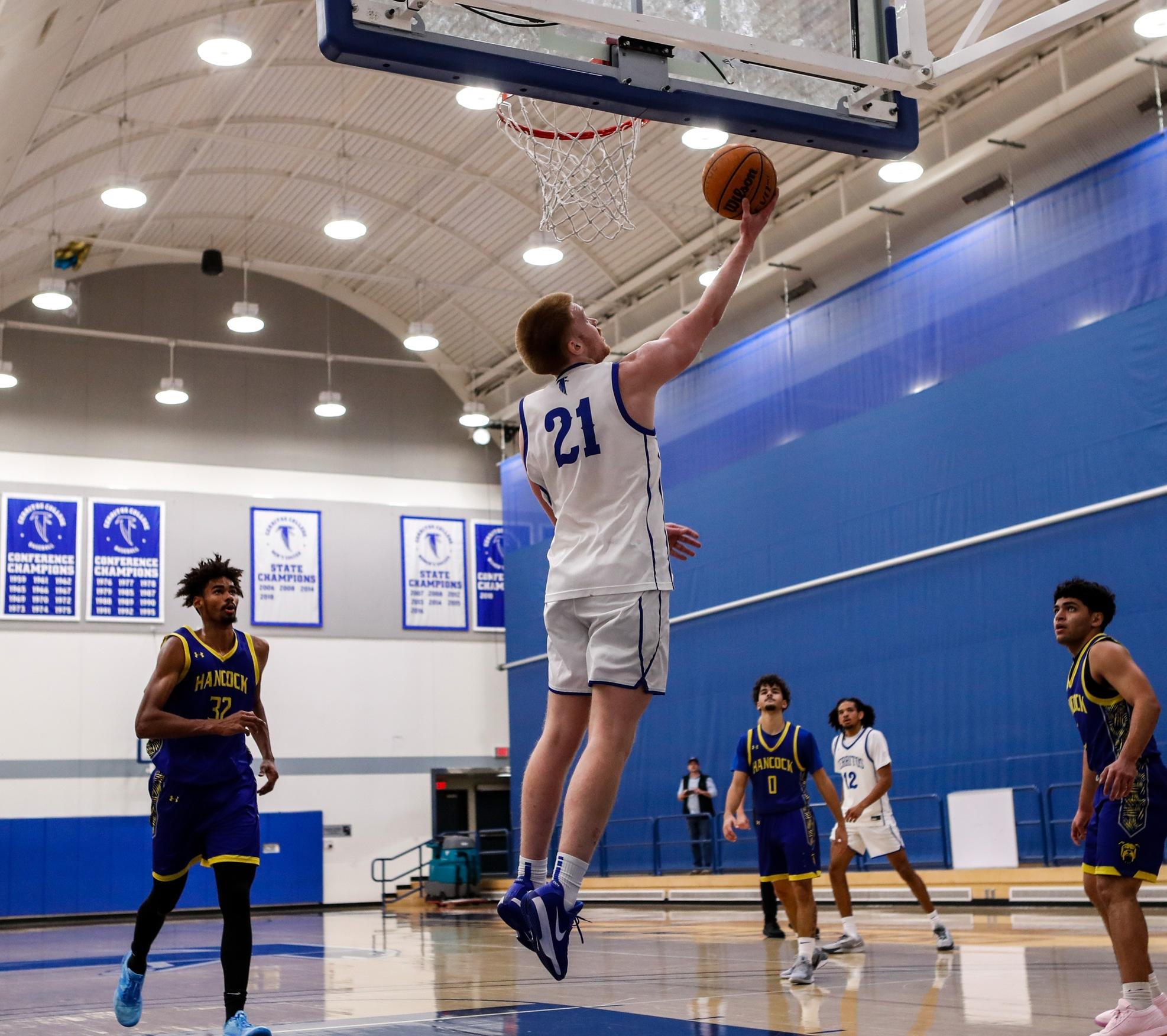 Gavin Carothers-Vukasovic scores two of his eight points against Allan Hancock.