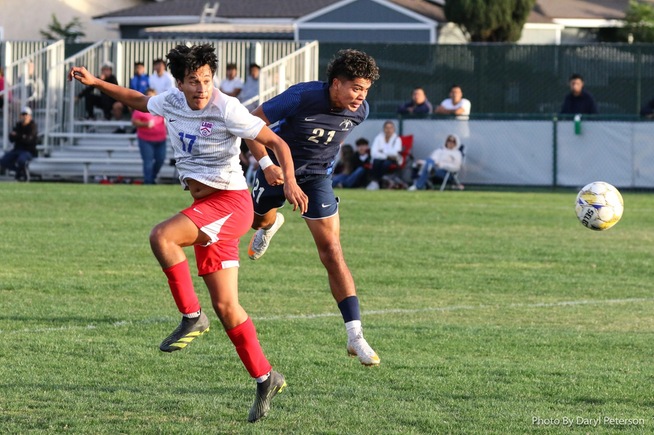 Jose Lopez heads home the game's lone goal in a Falcon victory