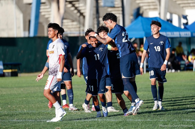 Team celebrates with Allan Gonzalez (11), who scored the Falcons fourth goal of the day