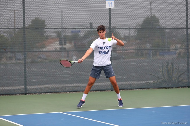 Marcos Paulo Silvestre returns a shot against Lake Forest (IL) College