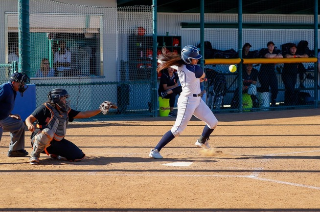 Dominique Jimenez pounds a squibber into the ground in what turned out to be the game-winning RBI