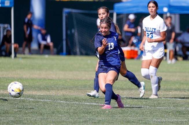 Ariana Rivera chips home the Falcons third goal of the game