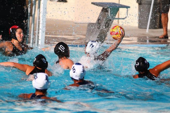 Angelica Hernandez (11) takes the game-winning shot in the second OT in a 12-11 win over Long Beach City College.