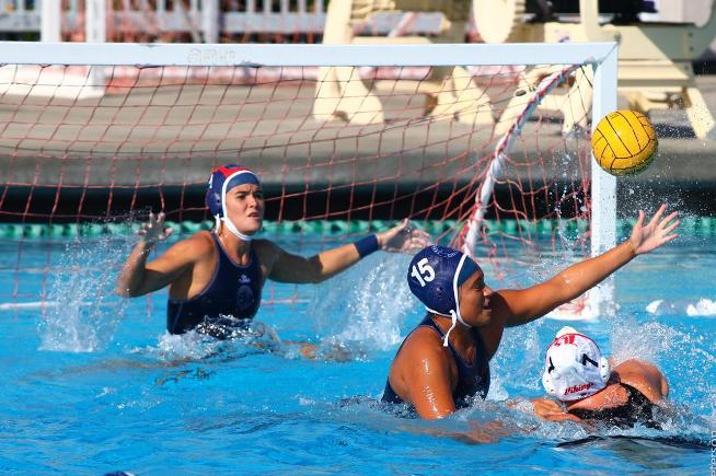 Kaitlyn Mendez (15) and Catherine Borunda (1) were unable to hold off visiting LB City in a 13-4 loss